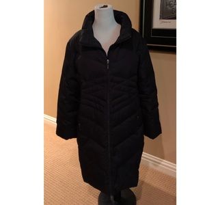 Black long down coat, w/zip pockets on side.